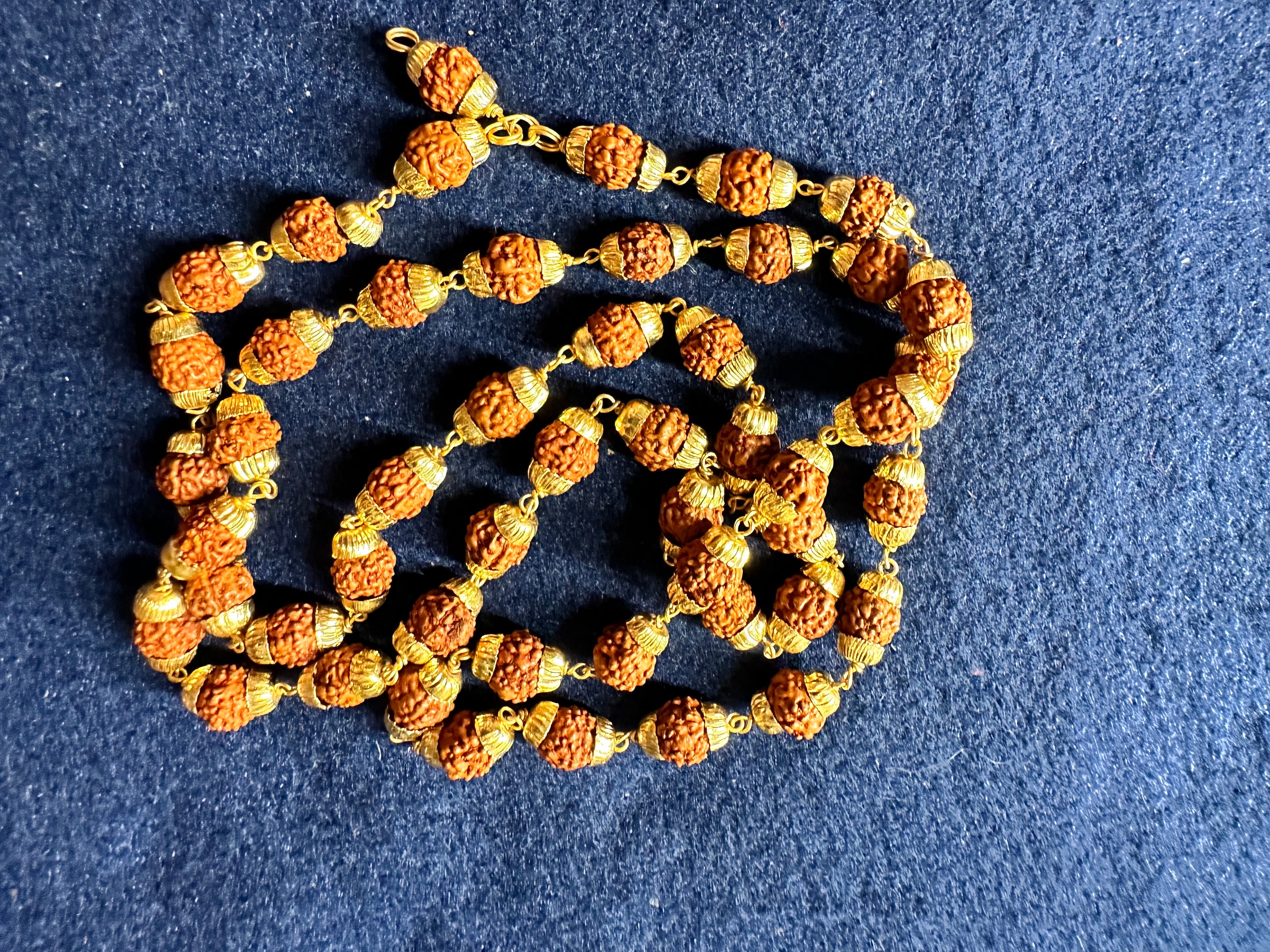 Rudraksha Mala on gold caps and links 54 beads The Amma Store